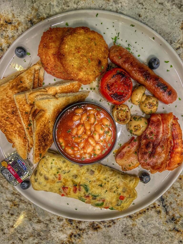 A full breakfast plate served at Woodbar